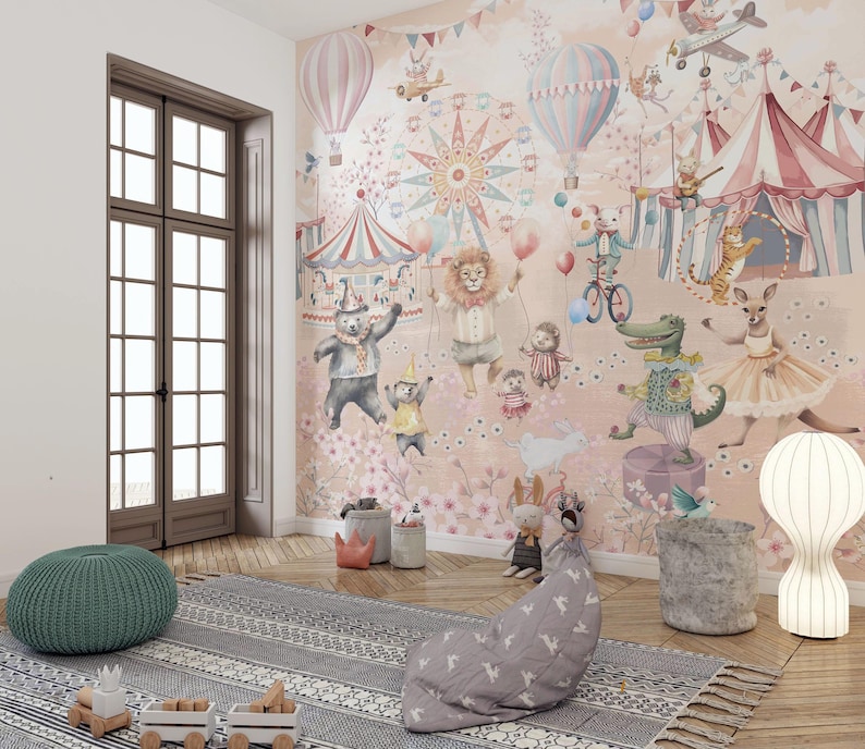 May include: A children's room with a circus-themed mural depicting animated animals, hot air balloons, and a carousel. The room includes a green ottoman, a grey rug, and a beanbag chair, creating a playful and inviting atmosphere.