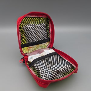 Minimalist first aid bag made of waterproof X-Pac with YKK Aquaguard zipper, compact and lightweight, in various colors