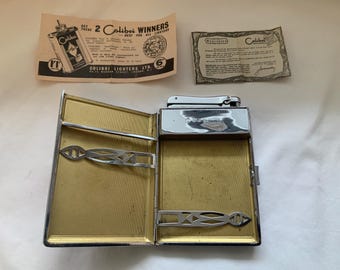 Estuche para cigarrillos Colibri Monopol cromado y encendedor de gasolina automático, años 50