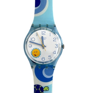 Swatch Gent 34mm PAQUITAS DAY vintage, mai indossato, del 2003 - come nuovo - batteria nuova installata - scatola originale