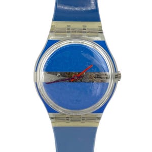 Orologio vintage Swatch Gent 34mm del 2002 - BLUE PAINTED TIME GB376 - mai indossato, in perfette condizioni di funzionamento - nuova batteria installata - scatola originale