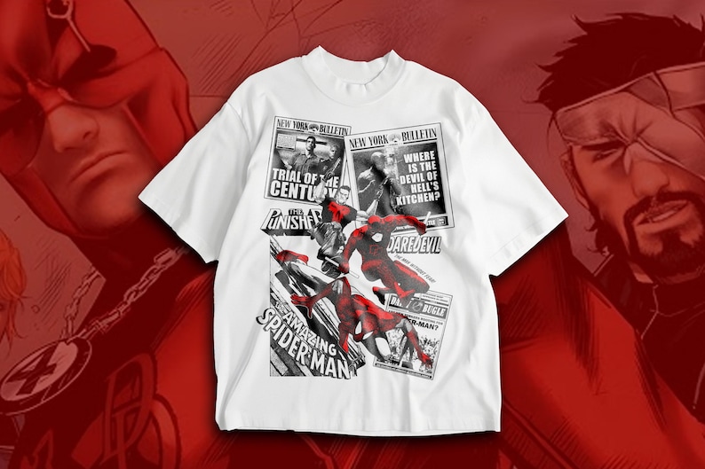 May include: White t-shirt with comic book graphics of Spider-Man and Daredevil. The design incorporates newspaper-style text elements, including "Trial of the Century" and "Where is the Devil of Hell's Kitchen?"