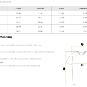 May include: A white chart detailing t-shirt measurements in centimetres, including length, shoulder, chest, and sleeve length. Sizes range from S to 2XL. A diagram shows how to measure the shirt, indicating length, shoulder, chest, and sleeve length.