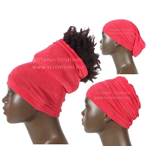 May include: Red stretchy fabric head wrap with a ponytail hole. The wrap is shown in three different styles. The text "Virtuous Creations www.vcreations.biz" is printed on the wrap.