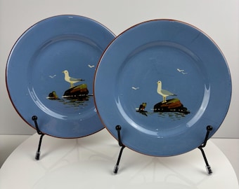 Dartmouth Pottery side plates in sky blue with hand painted seagull design.