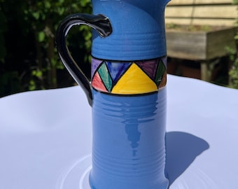 Watcombe Pottery Torquay ~ Tall 20cm blue jug with ‘Jazz Pattern’.