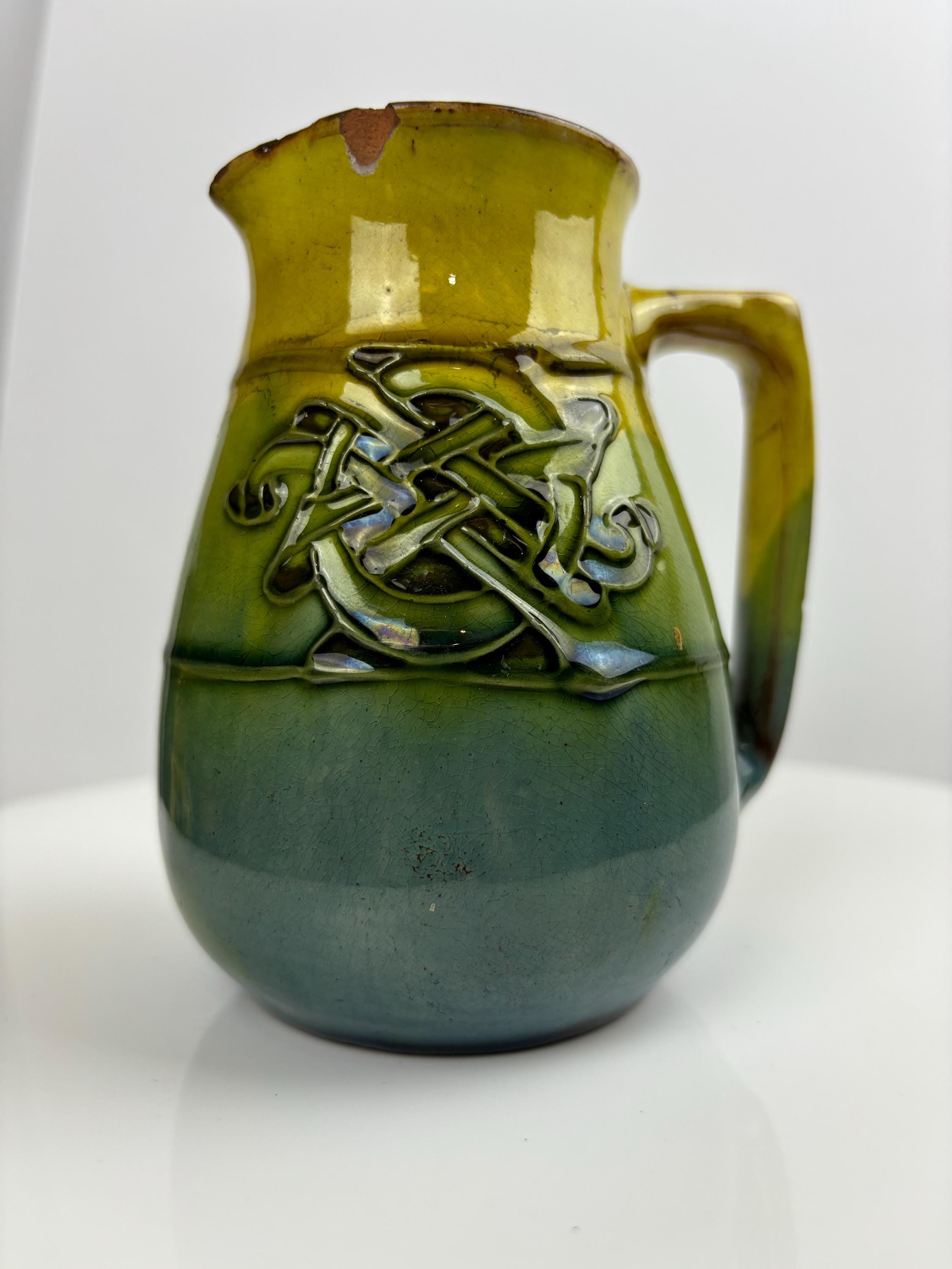 CH Brannam of Barnstaple 1900’s art nouveau jug retailed by Liberty & Co, London.