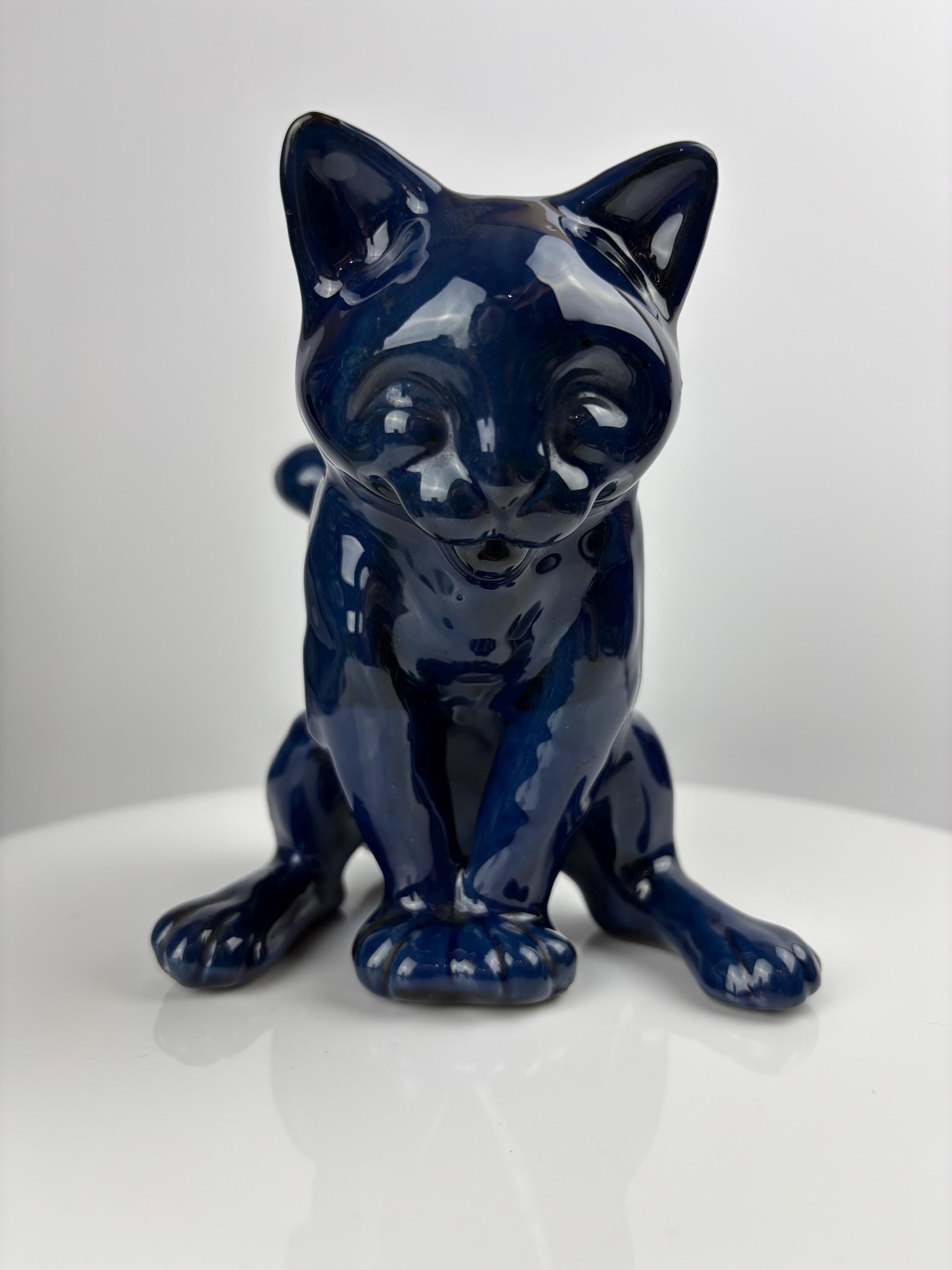 CH Brannam of Barnstaple antique pottery 5.25” ‘comical cat’ in classic blue glaze. This item is in perfect ‘as new’ condition.