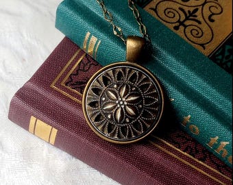 Necklace made with Vintage Button, Sunflower, Early Plastic, Bronze, Ivory, Extra Long Length, Faux Mirror Back