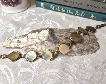 Antique Mother of Pearl Bracelet: Ivory, Gray, Brown, Opalescent Disc with Rainbow Sheen, Brass Ox Links