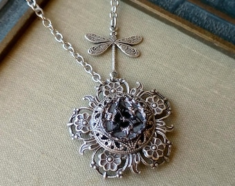 Necklace made with Antique Perfume Button, Trillium Flower, Gray, Dark Purple, Burgundy Highlights, Antique Silver Filigree, Dragonfly