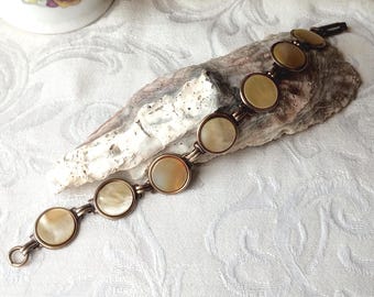 Antique Mother of Pearl Bracelet:  Beige Opalescent Disc, Brass Ox Links