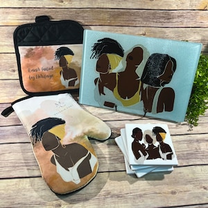 May include: A set of kitchen accessories featuring a black pot holder with the text "Flavor fueled by Heritage", a glass cutting board with a design of three women with brown skin, a brown and white oven mitt with a design of a woman with brown skin, and four white coasters with a design of three women with brown skin.