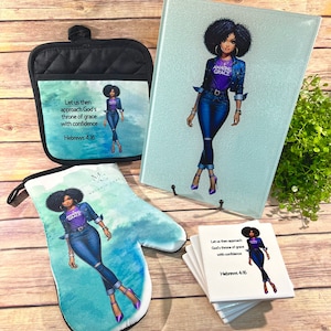 May include: A set of kitchen accessories featuring a woman with an afro wearing a denim jacket and jeans. The set includes a pot holder, oven mitt, cutting board, and coasters. The woman is depicted with the text "Amazing Grace" on her shirt and the text "Let us then approach God's throne of grace with confidence Hebrews 4:16" on the pot holder and coasters.