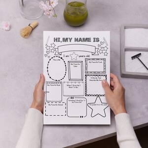 May include: A printable worksheet with the text "Hi, My Name Is" at the top. The worksheet has several blank boxes for a child to fill in information about themselves, such as their name, age, favorite color, favorite food, and favorite book.
