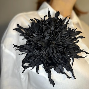 Black flower brooch