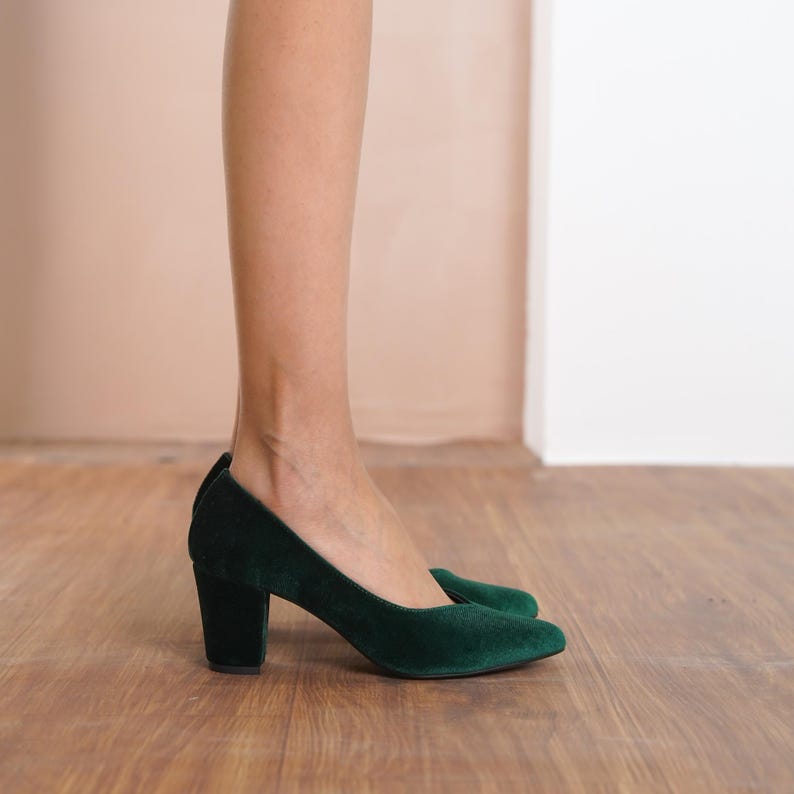 Angled side view of green silky velvet sweetheart bridal block heels, highlighting the elegant design, medium high block heel, and supportive structure by Hyl Wedding Shoes.