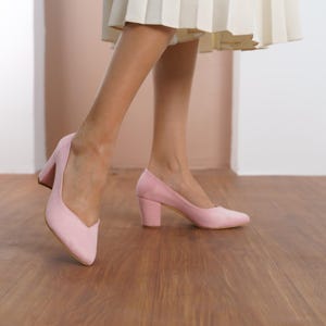 Close-up side view of dusty rose vegan suede bridal block heels, emphasizing the sleek design, medium high block heel, and comfort-focused fit by Hyl Wedding Shoes.