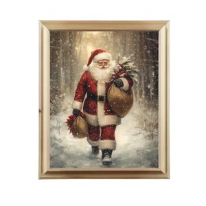 May include: A framed print of Santa Claus walking through a snowy forest. Santa is wearing a red suit with white trim, carrying two sacks and a bundle of greenery. The artwork has a vintage, painterly style.