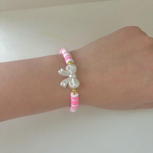 pinkie paradise bow bracelet