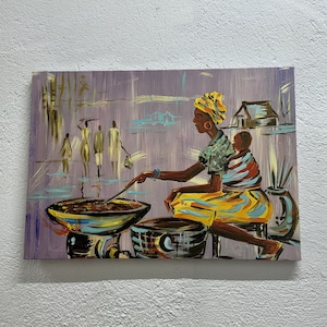 May include: A colorful painting depicting a woman with a baby on her back, cooking over a fire in a large pot. The woman is wearing a yellow skirt and a blue and green top. The background is a purple and blue landscape with a small house in the distance.