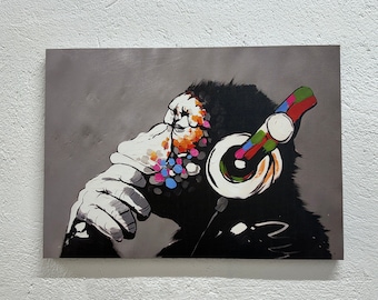 Canvaskunst Banksy Monkey: graffitichimpansee met koptelefoon