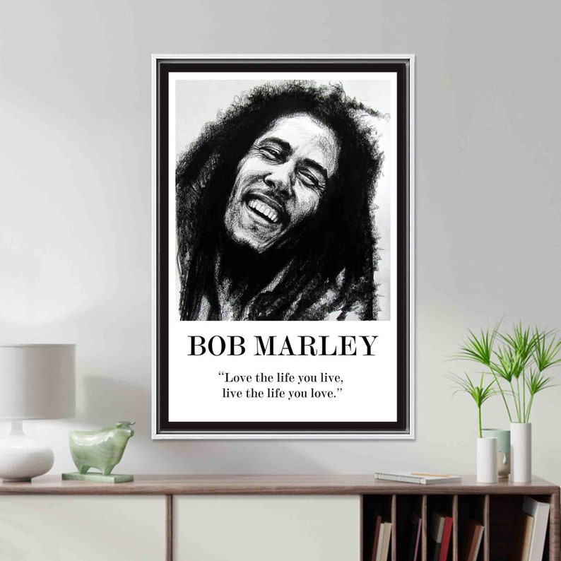 May include: Black and white portrait of Bob Marley with the quote "Love the life you live, live the life you love."