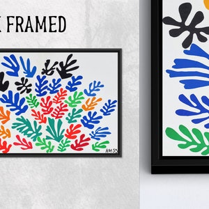 May include: A black framed print of a colorful abstract painting featuring a cluster of stylized leaves in shades of blue, red, green, orange, and yellow. The painting is signed "HM 53" in the bottom right corner.