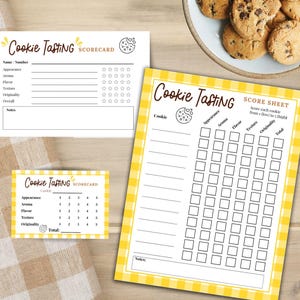 May include: Three printed cookie tasting scorecards and score sheets with black text on white and yellow gingham backgrounds. The cards feature categories for appearance, aroma, flavor, texture, and originality, with star or box rating systems.