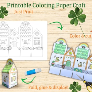 May include: Printable coloring paper craft of a house with a shamrock design. The craft is ready to be colored, cut out, folded, and glued together. The image includes instructions to "Just Print", "Color & cut", and "Fold, glue & display!"