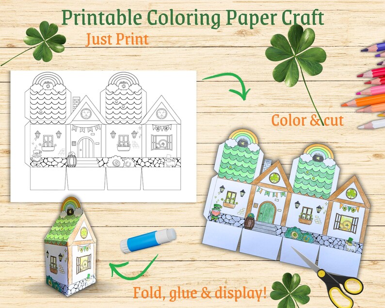 May include: Printable coloring paper craft of a house with a shamrock design. The craft is ready to be colored, cut out, folded, and glued together. The image includes instructions to "Just Print", "Color & cut", and "Fold, glue & display!"