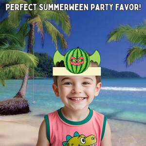 May include: A child wearing a watermelon-themed party hat with green wings and a spooky face. The hat is on a tan headband. The text "PERFECT SUMMERWEEN PARTY FAVOR!" is at the top. The child is wearing a pink tank top with a cartoon dinosaur.