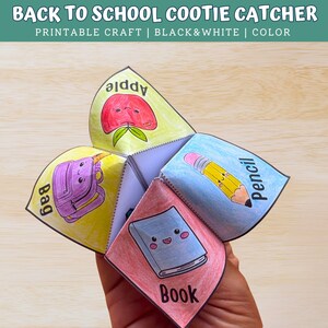 May include: A paper cootie catcher craft featuring colourful hand-drawn illustrations of school supplies including a red apple, a purple backpack, a yellow pencil, and a blue book, each labelled with its name in black text for a back to school theme.