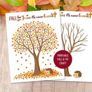 May include: Two white sheets of paper featuring a tree illustration with the text FALL for Jesus He never leaves. One tree is filled with colourful autumn leaves and a hedgehog, while the other is a bare outline for a printable Q-tip craft.