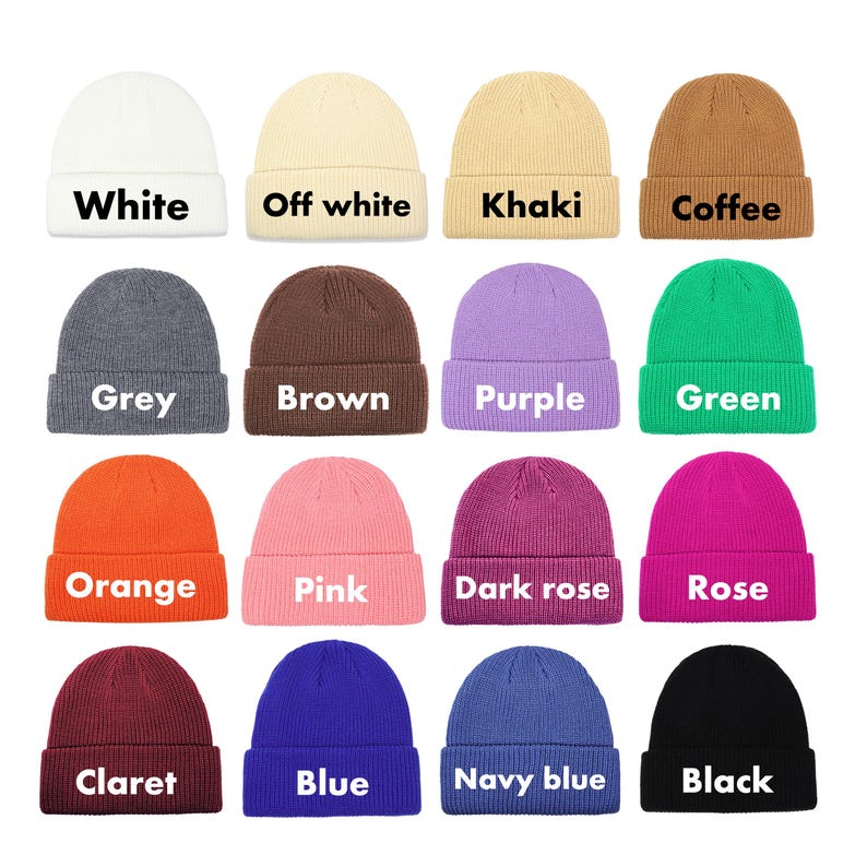 May include: A collection of colorful knit beanies in various shades, including white, grey, orange, and black. Each beanie has a folded cuff and a label with its color name. The image displays a range of colors, from neutral tones to vibrant hues.