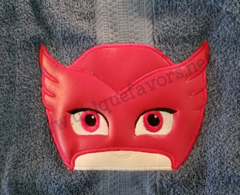 Masks inspired characters with optional personalization. Hooded towels or other items available. 3 characters to choose from image 4