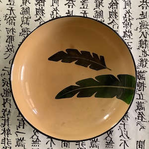 Vintage lacquer bowl made in Japan - black & tan with green and black leaves or feathers