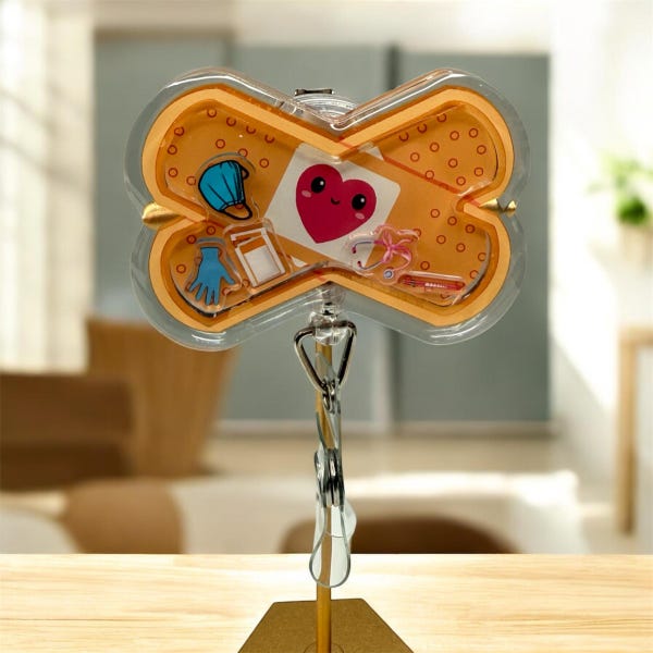 Band Aid Essentials Shaker Badge Reel
