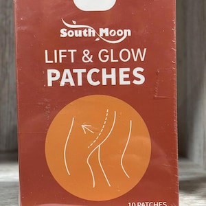 May include: A rectangular box of "South Moon Lift & Glow Patches" in a reddish-brown hue. The packaging features white text and an orange circle with a diagram. The box contains 10 patches.
