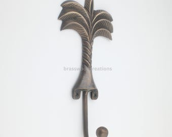 Gancho artesanal de latón macizo con forma de palmera: decoración rústica para la pared