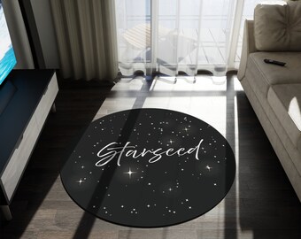 Tapis rond noir avec motif graines et étoiles