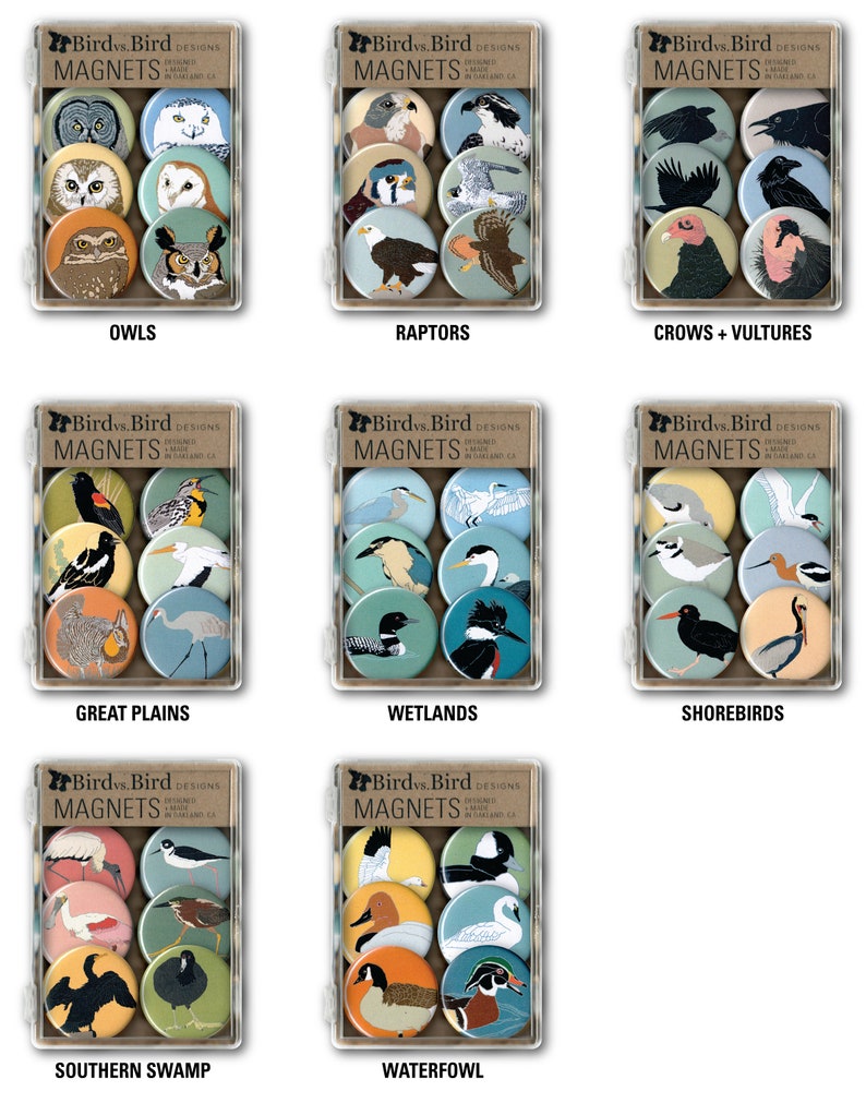 May include: Set of nine round refrigerator magnets featuring colorful illustrations of different bird species. Each magnet has a white border and the text "Bird vs. Bird Designs" and "Magnets" printed on the top. The magnets are organized into nine categories: Owls, Raptors, Crows + Vultures, Great Plains, Wetlands, Shorebirds, Southern Swamp, Waterfowl.
