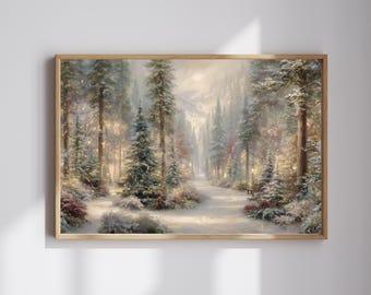 May include: A rectangular wall art print in a light wood frame depicting a snowy forest landscape. Tall evergreen trees are covered in light snow, with soft golden lights glowing among the branches. A path leads through the centre of the woods.