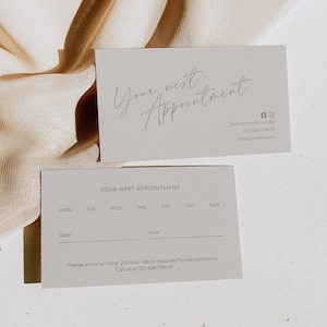 May include: Two rectangular appointment cards in light grey with dark grey text. The top card features the script text Your next Appointment, social media icons, and phone number. The bottom card lists days of the week, date, time, and cancellation policy.