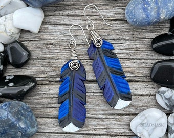 Blue jay feather tooled leather earrings with sterling silver wire wrap. Handcrafted bluejay jewelry for bird watchers, nature lover gift.