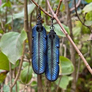 Iridescent raven feather leather earrings with black niobium shepherd's hooks. Black bird or crow jewelry for nature lover. Gift for wife.