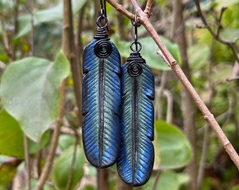 Iridescent raven feather leather earrings with black niobium shepherd's hooks. Black bird or crow jewelry for nature lover. Gift for wife.