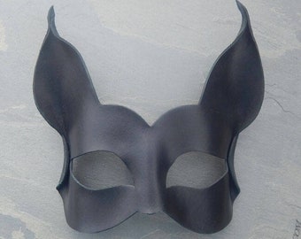 Spooky black cat leather masquerade mask. Unisex adult Halloween costume. Elegantly simple animal mask, could be a cat or vampire bat.