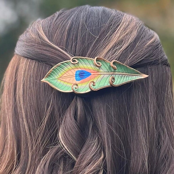 Hand painted peacock feather leather hair accessory. Jewel toned emerald green bird feather hair accessory with metal French clip barrette.