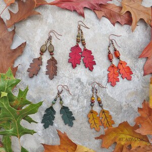 dangling oak leaf earrings made from natural leather and semiprecious stone